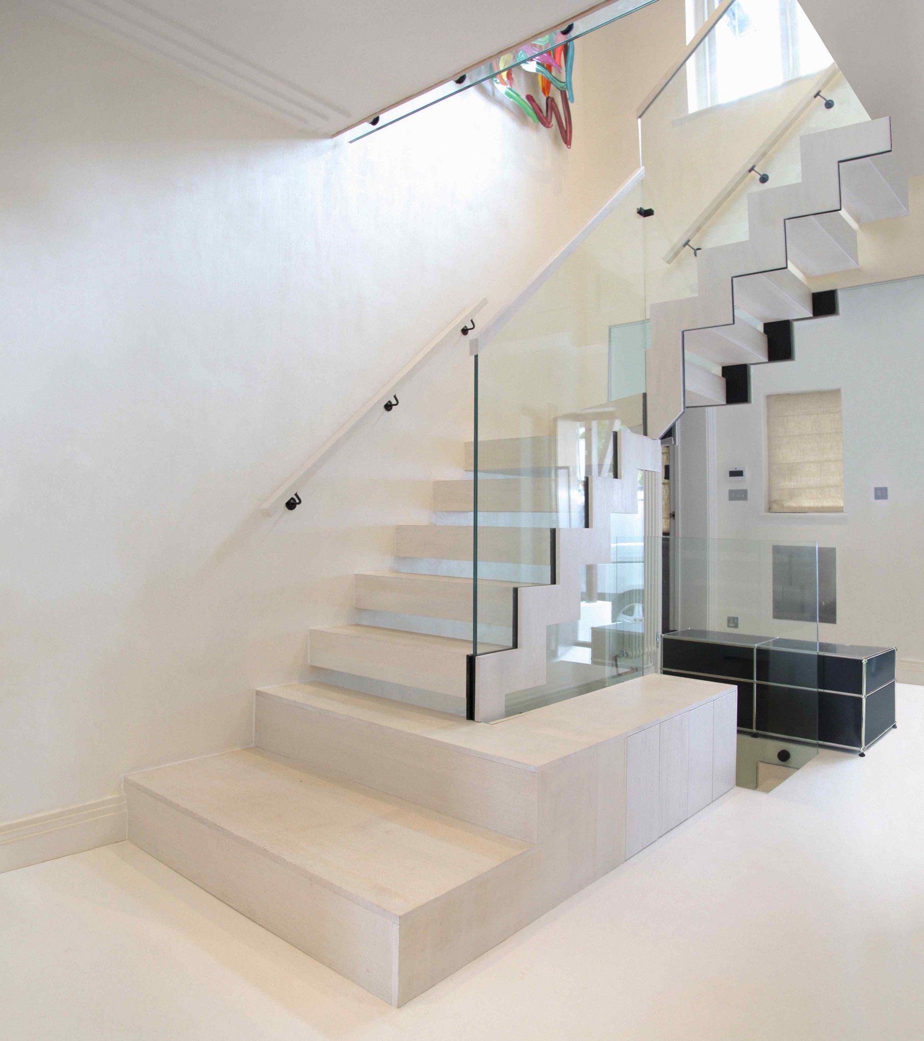 Bespoke ZIG-ZAG staircase with Glass balustrade