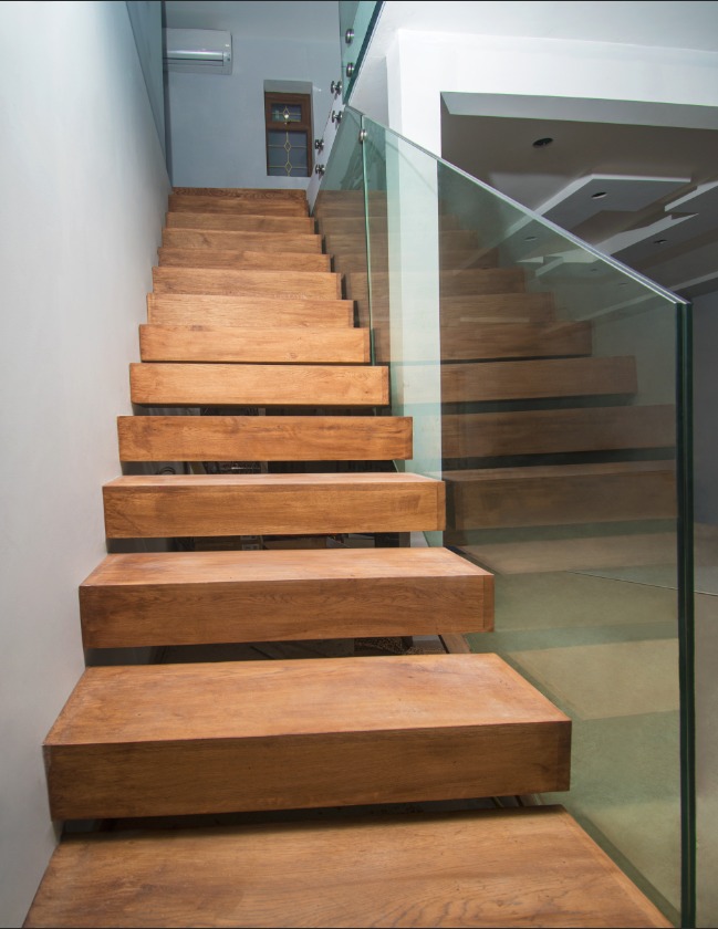 Bespoke floating staircase with Glass balustrade