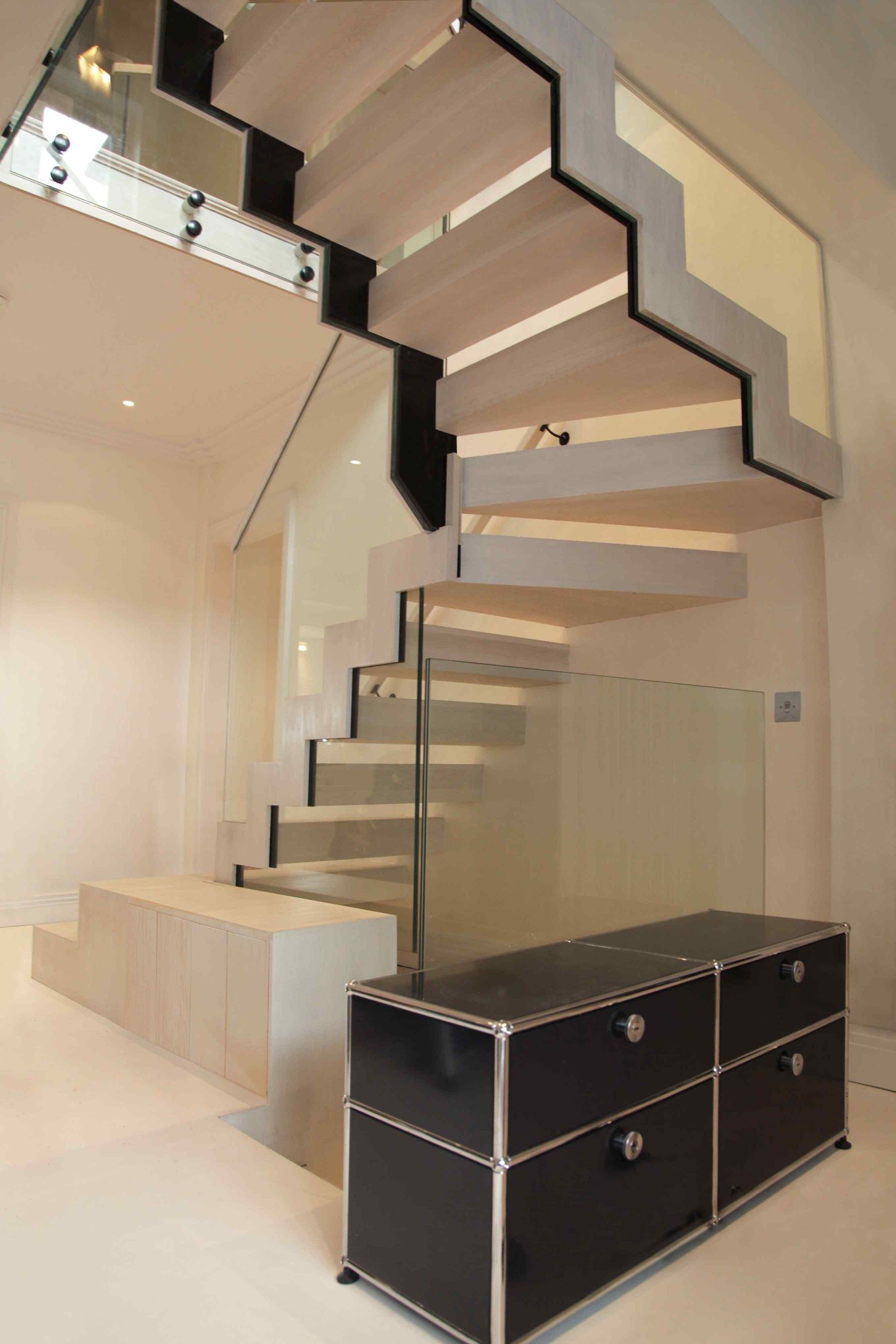 Bespoke ZIG-ZAG staircase with Glass balustrade