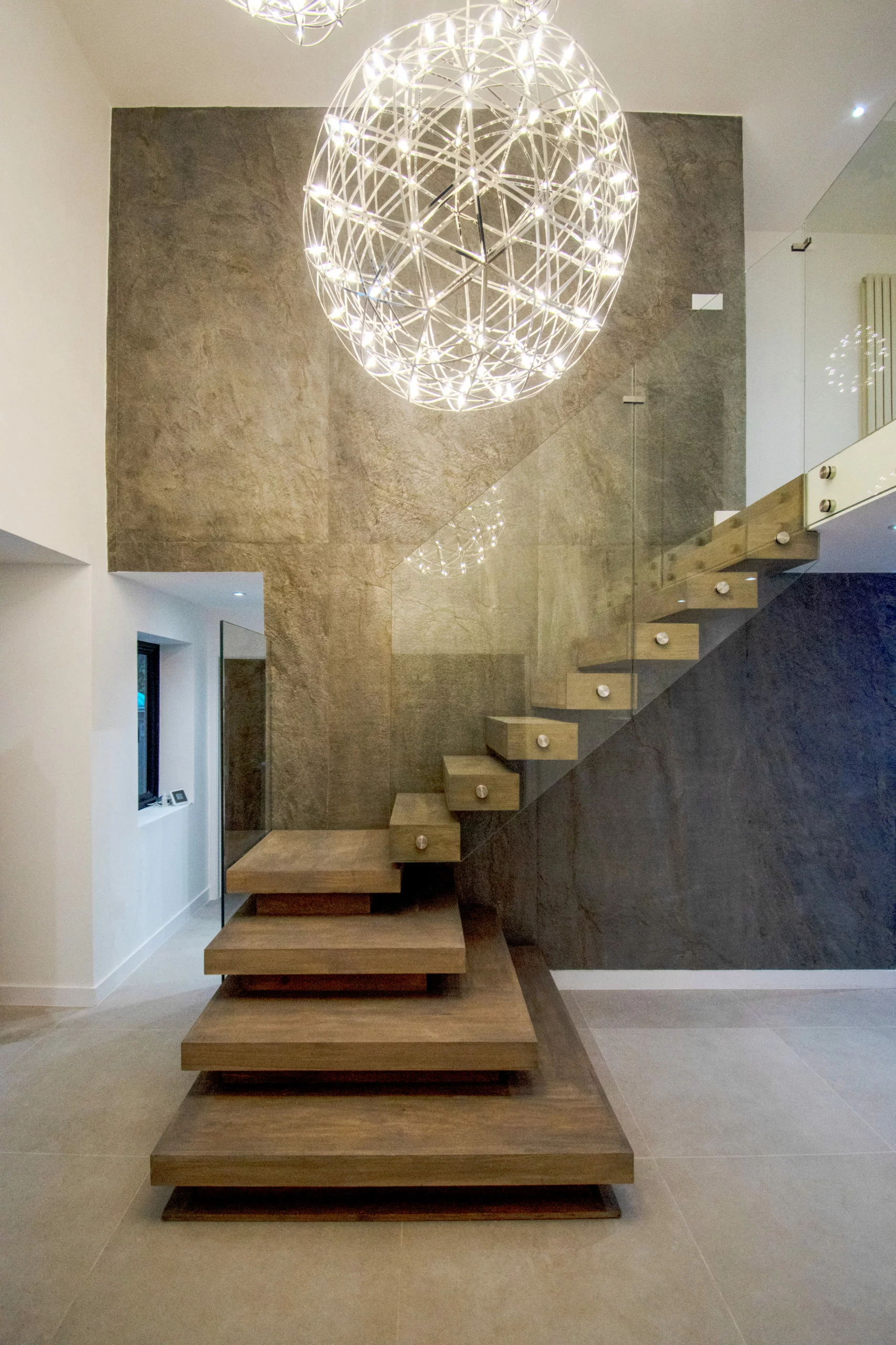 Floating staircase with glass balustrades