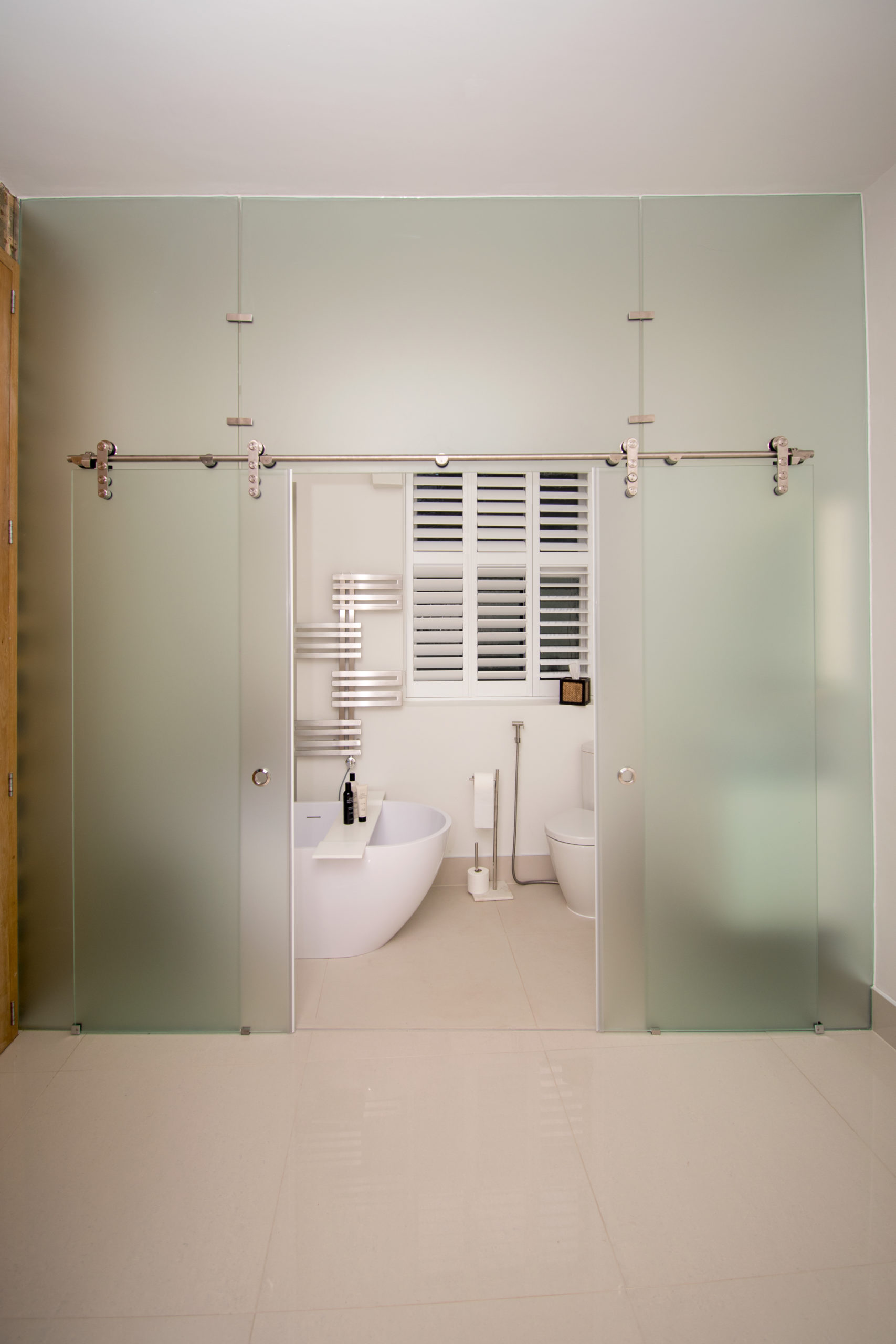 Shower enclosure with frosty glass
