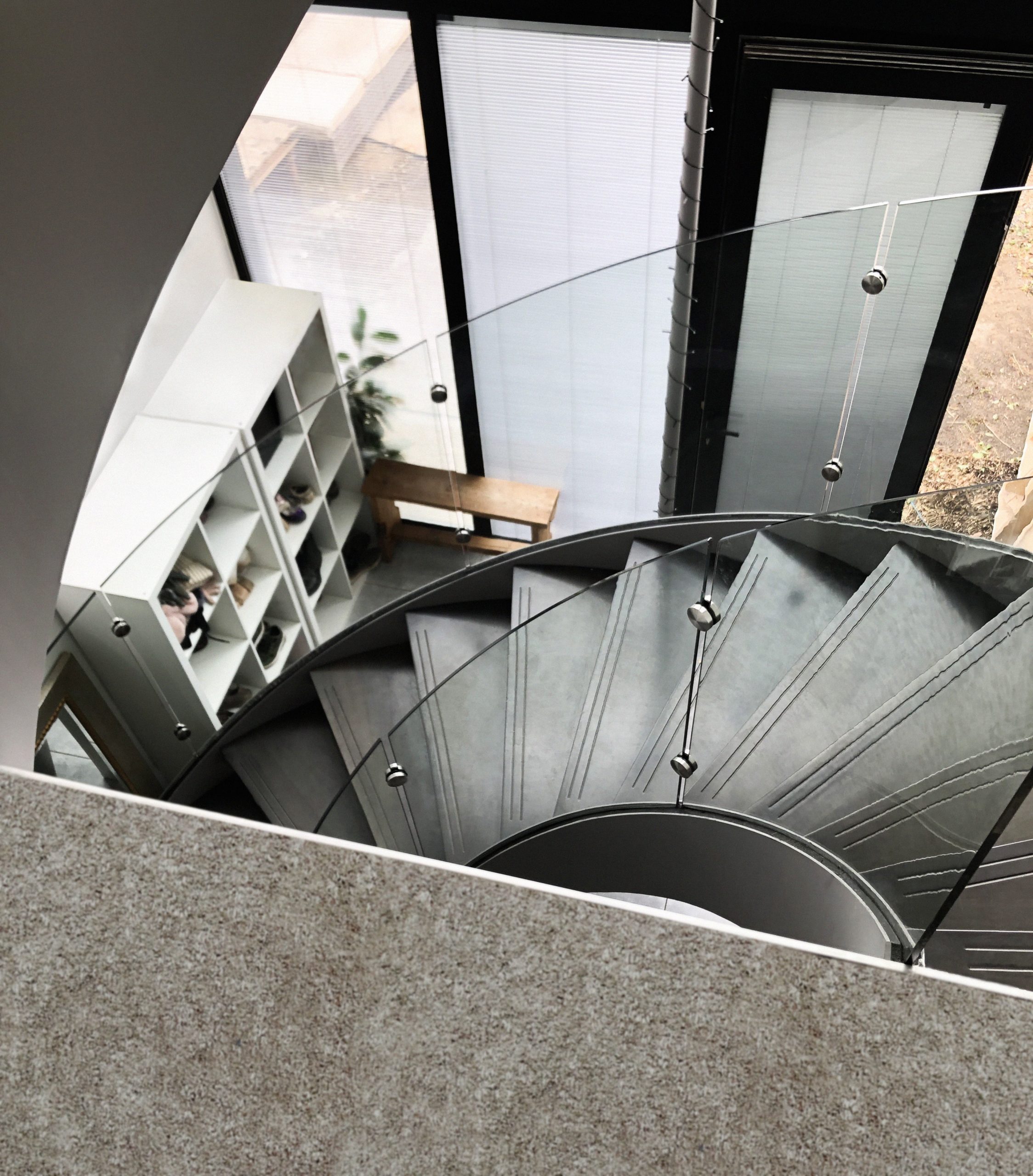 helical staircase with glass balustrade