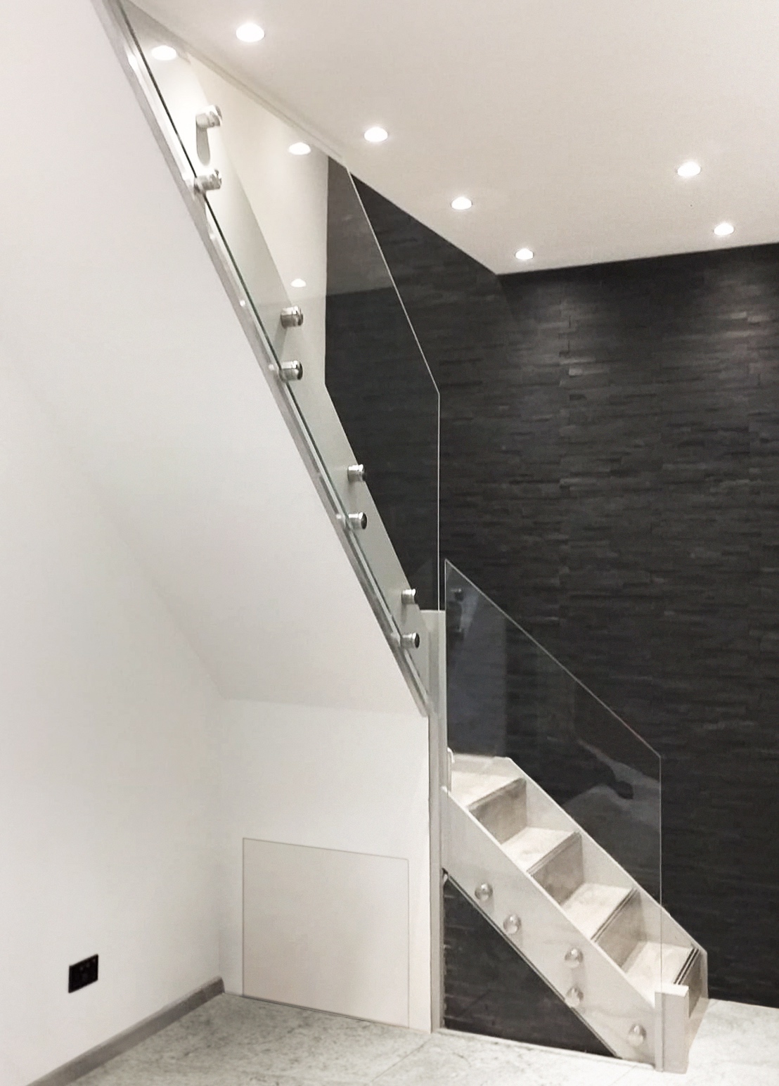 modern white staircase with glass balustrade