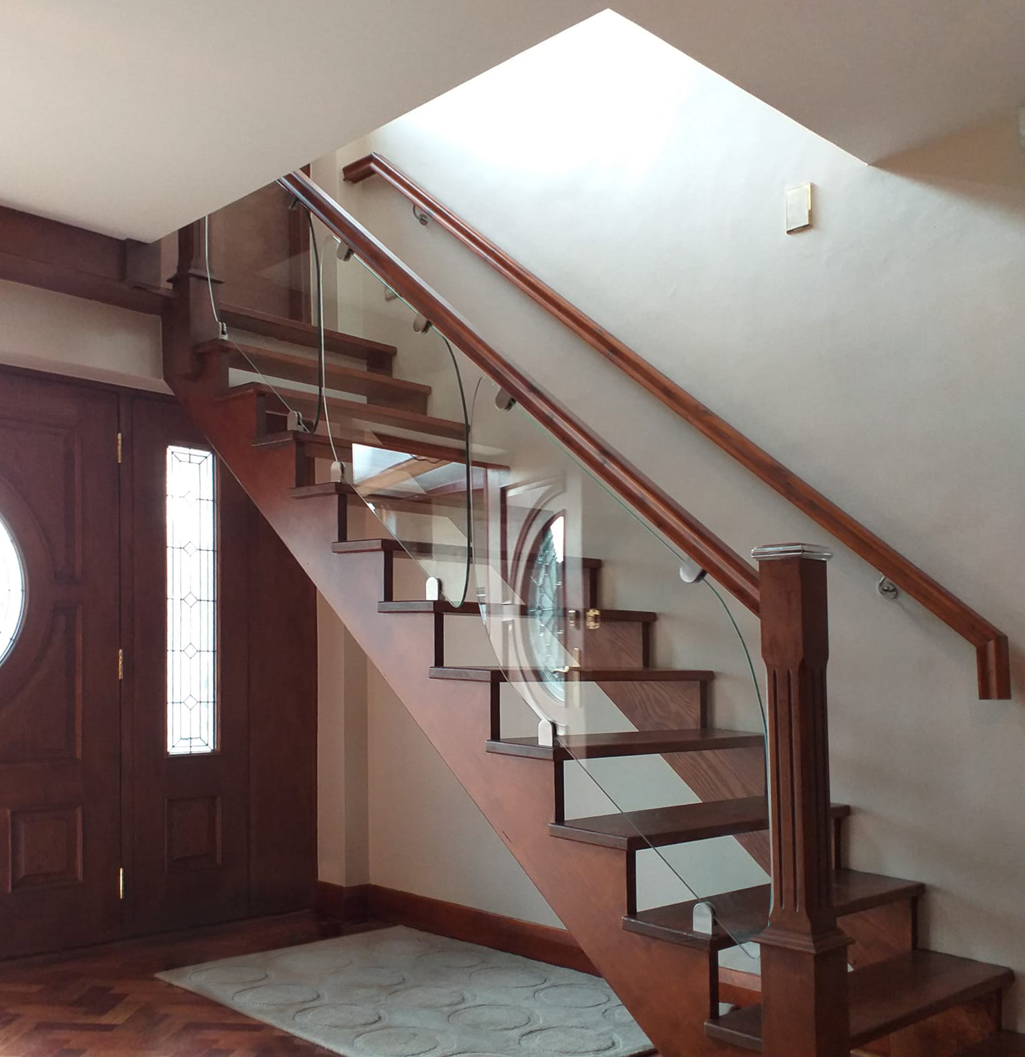 Wooden Staircase with glass balustrades
