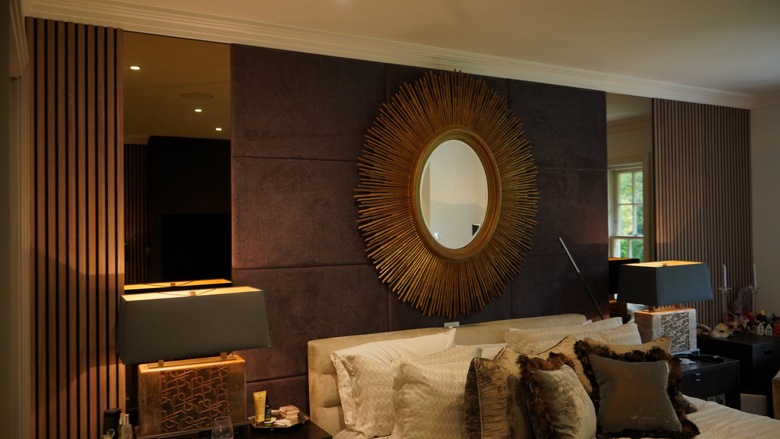 Decorative Mirror in the center of the bedroom