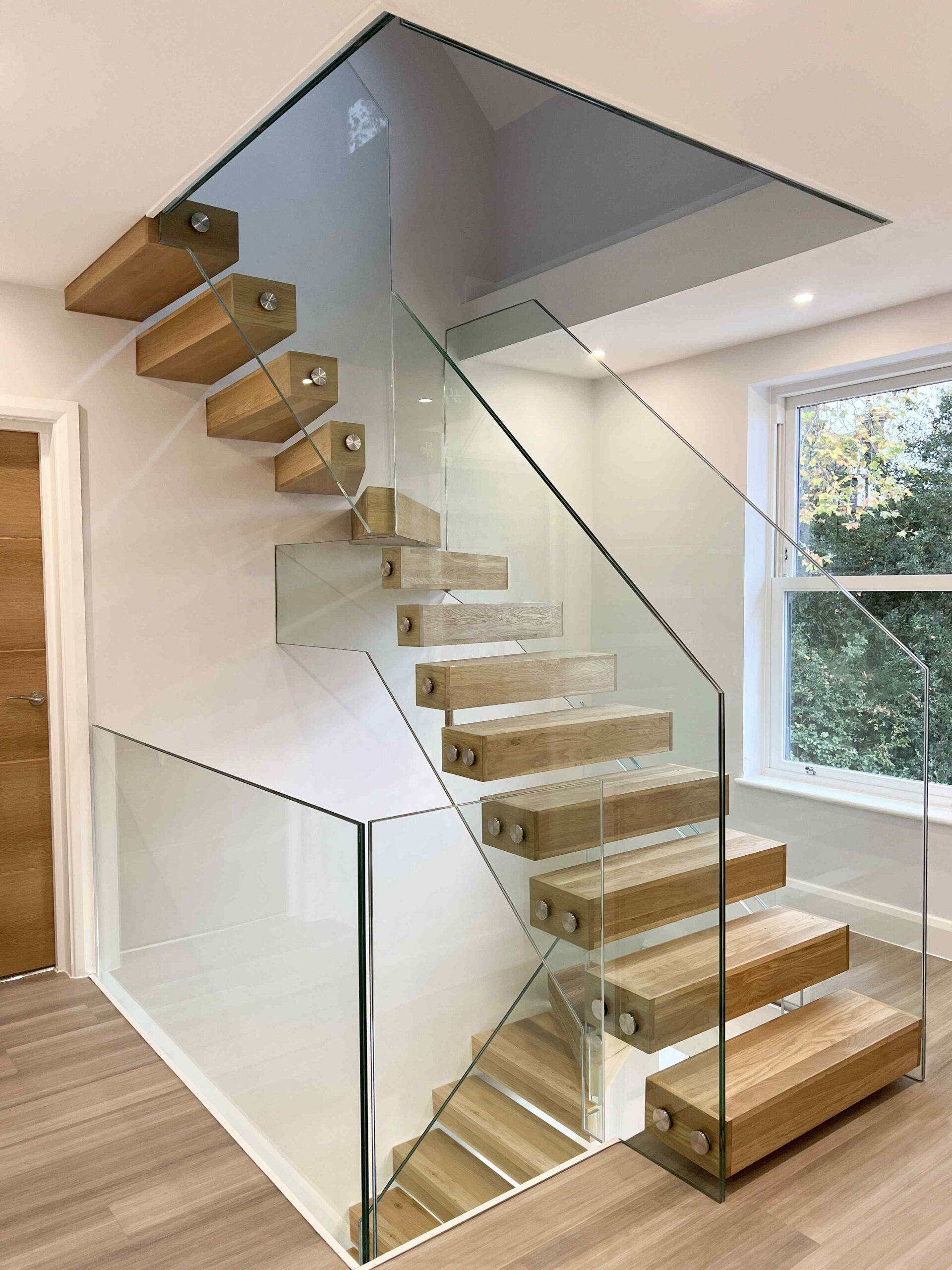 Flying staircase with glass balustrades