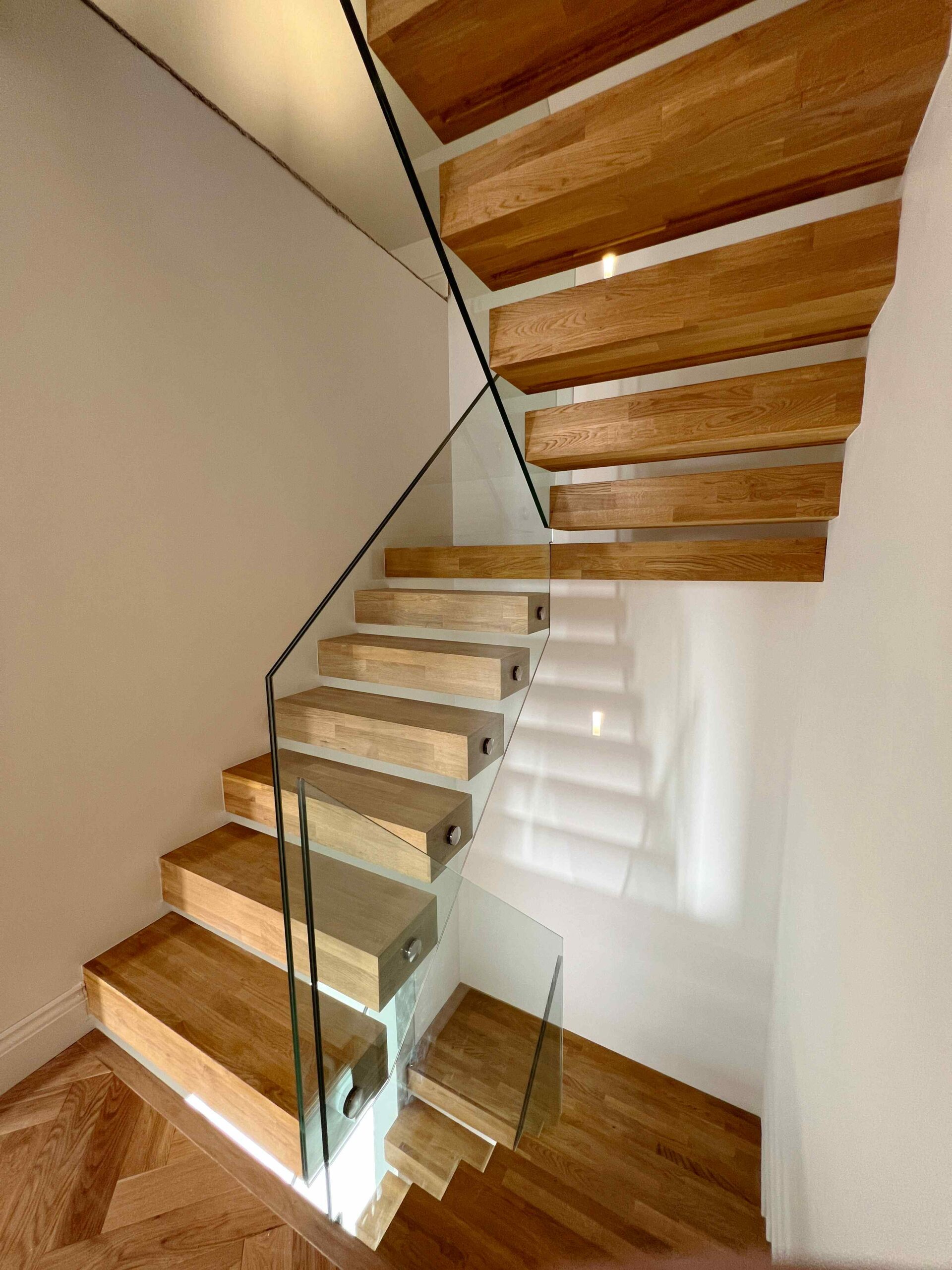 Floating staircase with glass balustrades