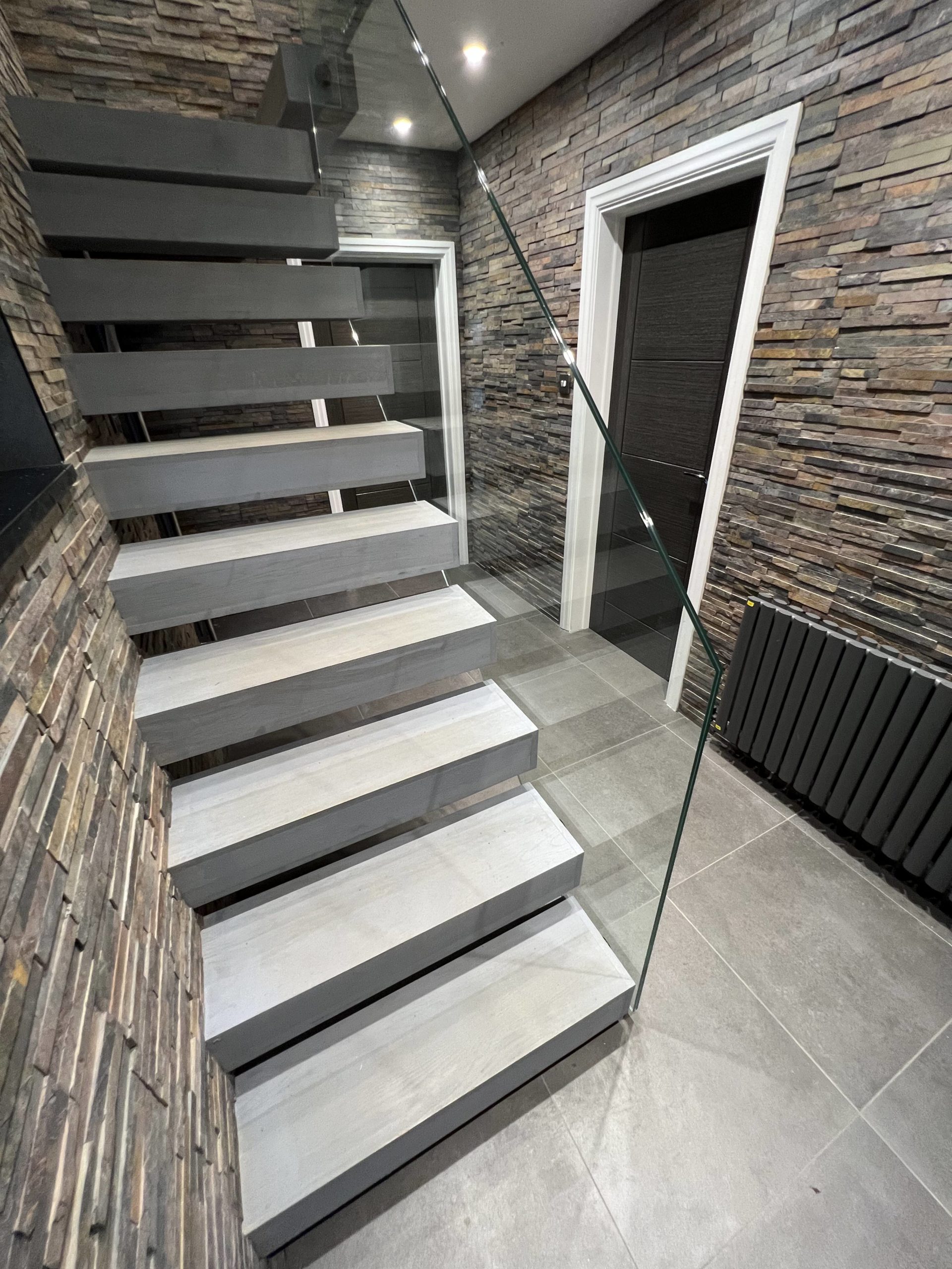 Floating staircase with glass balustrades