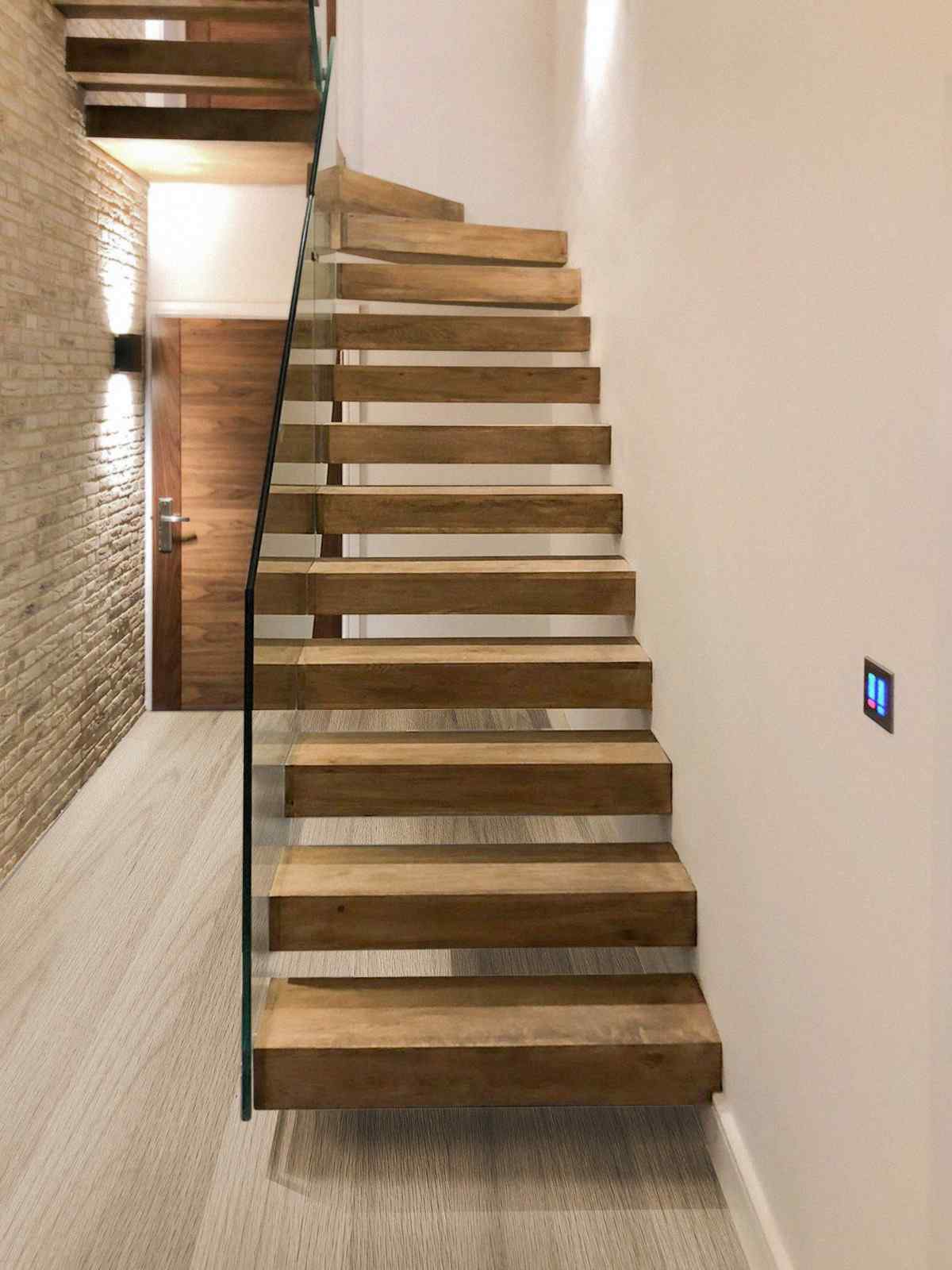 floating staircase with glass balustrade