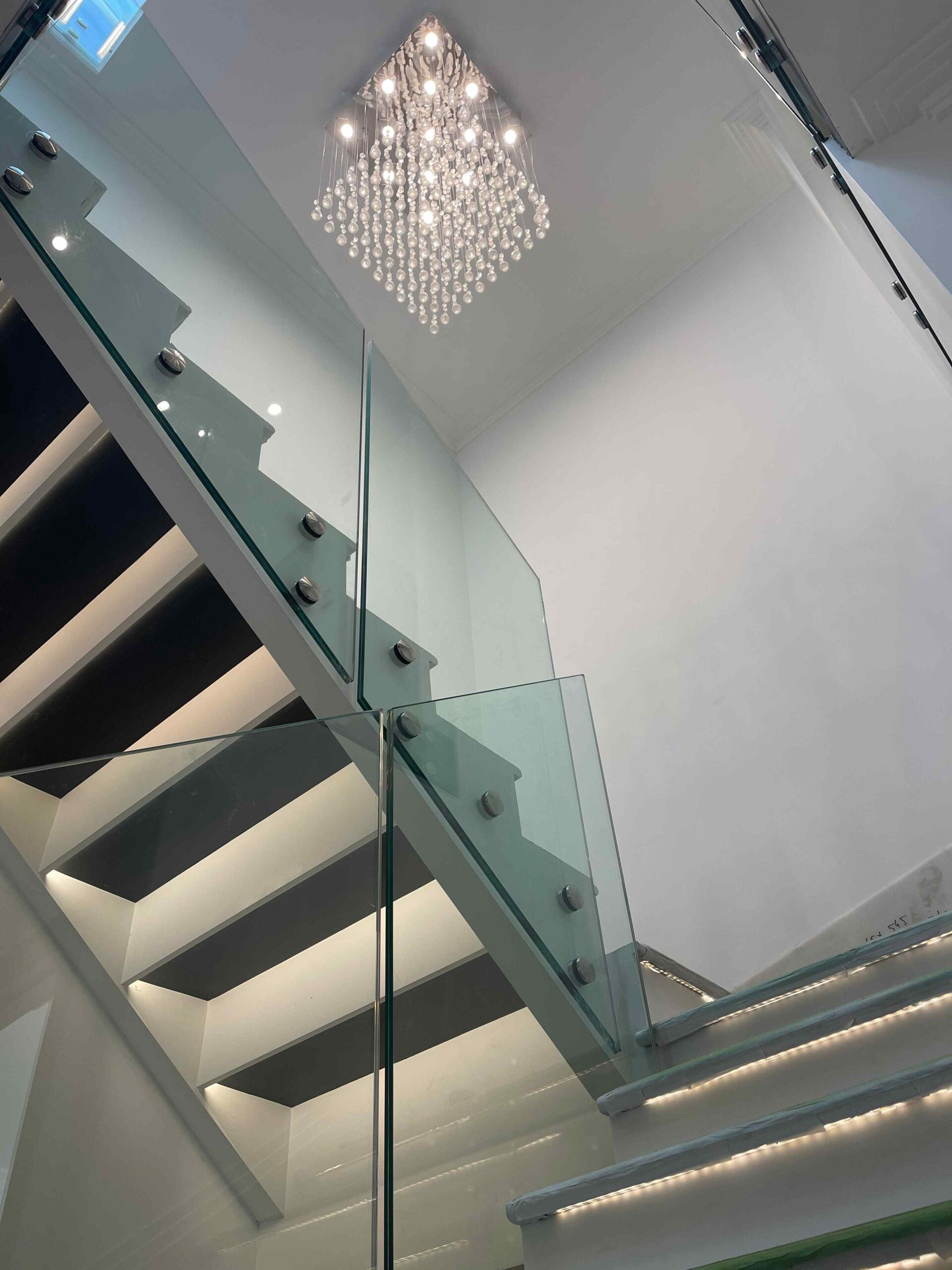modern staircase with glass balustrade
