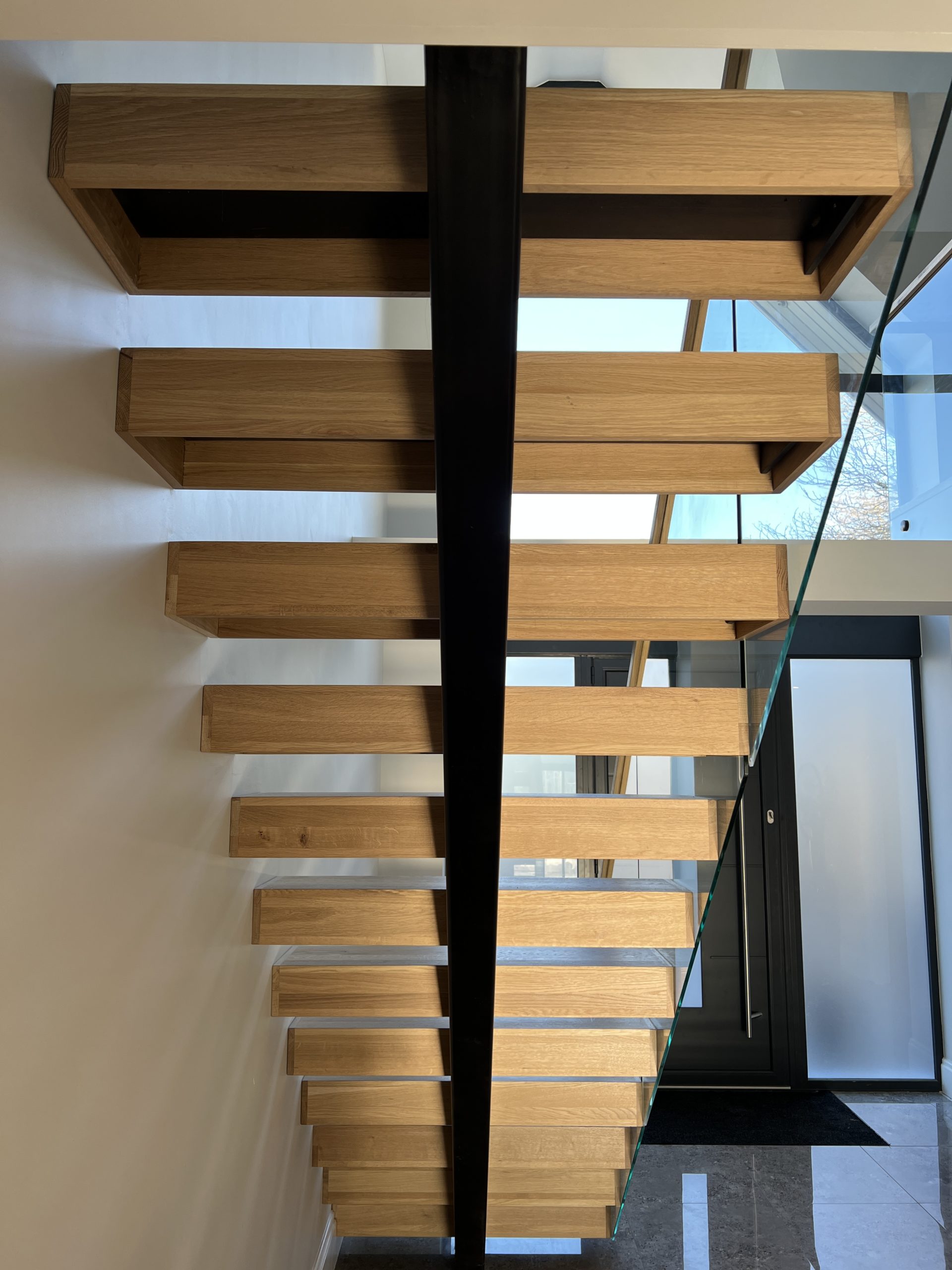 spine staircase with glass balustrade