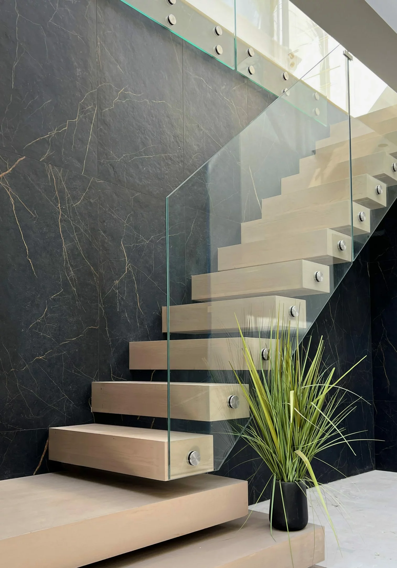 Floating staircase with glass balustrades